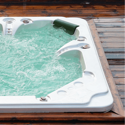 Chill out in the home's outdoor hot tub