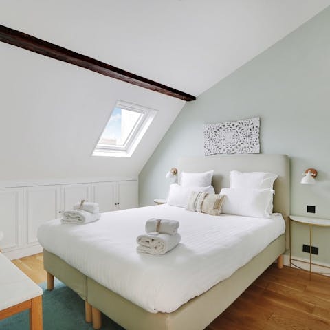 Wake up to Paris skies from the bedrooms' skylights