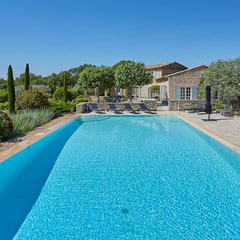 Swim gentle laps in the private swimming pool after a day trip to Avignon