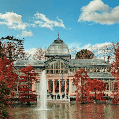 Enjoy a leisurely stroll around Madrid's iconic Retiro Park, a twenty-minute walk away