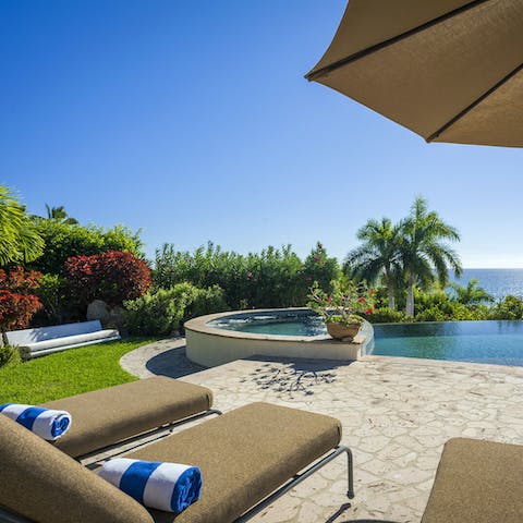 Lounge away the afternoon by the pool