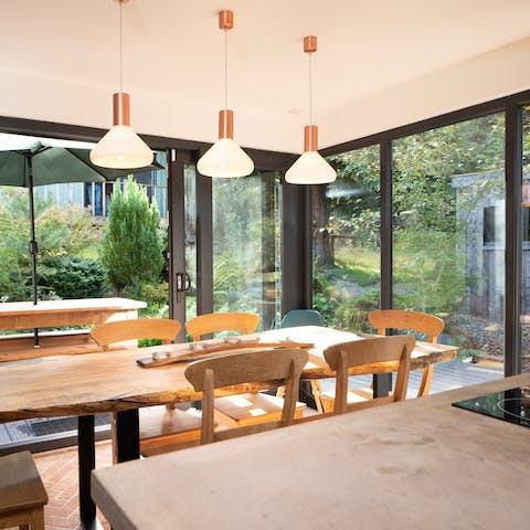Enjoy forest and garden views from the breakfast table