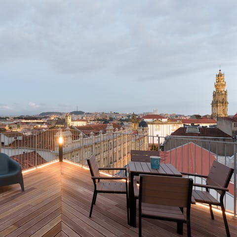Sip a sundowner on the communal rooftop terrace while admiring views of the Torre dos Clérigos