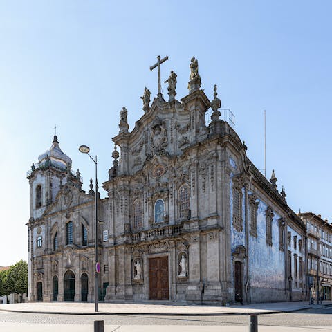 Visit the beautiful Igreja do Carmo, a three-minute walk away