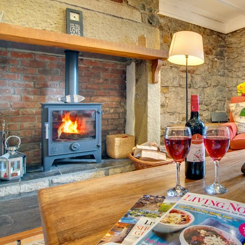 Cosy up in front of the wood-burning stove 