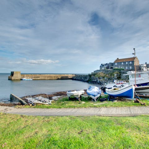 Watch the fishing boats come in from the harbour