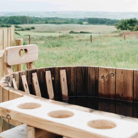 Soak up views of Portballintrae from the private wood fired hot tub