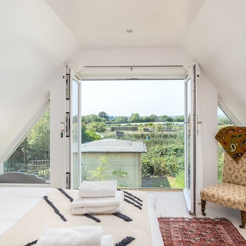 Enjoy views of the local countryside from the bedroom