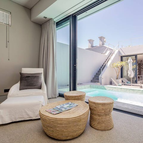 Wake up in the stylish bedroom and step straight out onto the patio for a dip in the pool