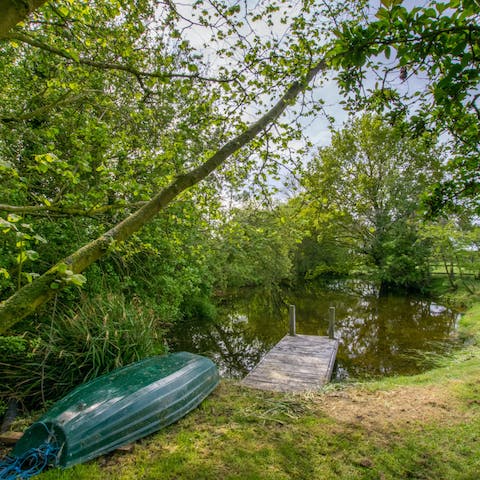 Paddle around the pond in the boat and see what wildlife you spot