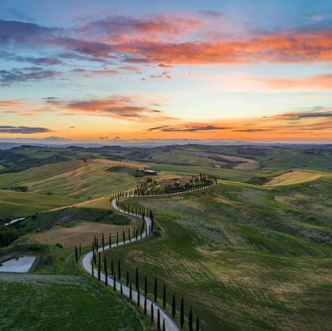 Enjoy the stunning rolling hills of Tuscany – perfect for a hike
