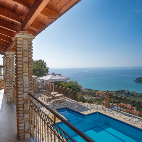 Enjoy your morning coffee on the balcony before taking a dip in the pool