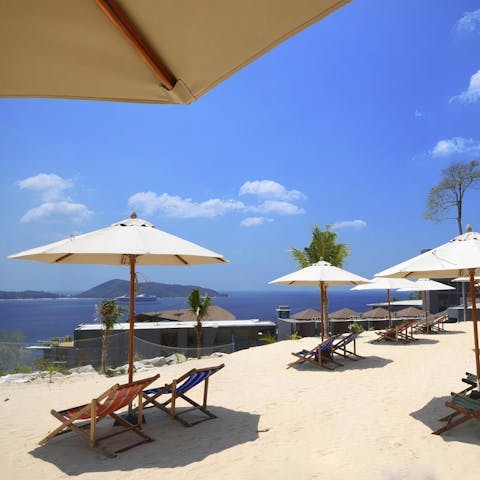 Make friends on these sun-kissed sands after an authentic Thai massage in the on-site spa