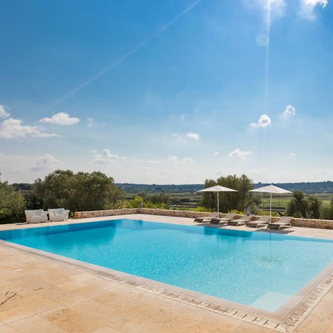 Stretch out by the pool and soak up the golden rays