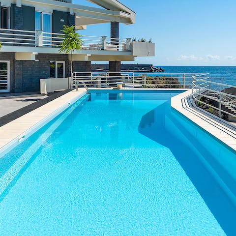 Take a refreshing dip in the with a sea view