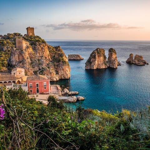 Stay in the fishing village of Stazzo, located between Catania and Taormina