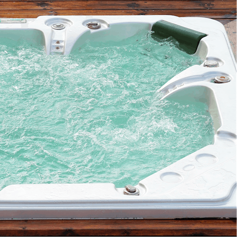 Relax and unwind in the home's hot tub