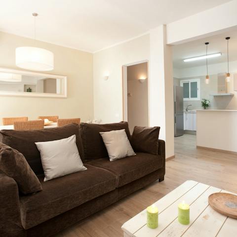 Relax in the open layout of your immaculate apartment