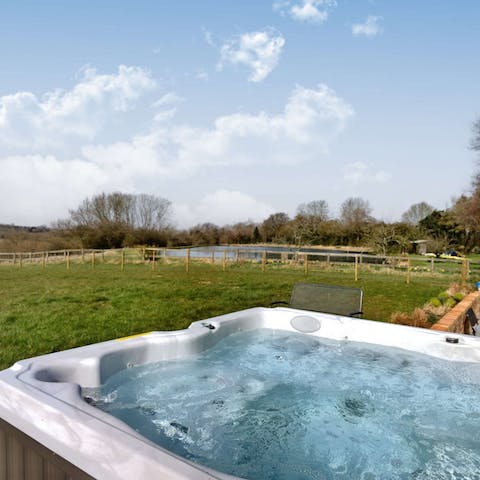 Embrace the natural elements while soaking in the hot tub