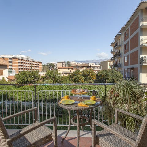 Sip an espresso out on your balcony, perfect for watching sunsets over the townscape