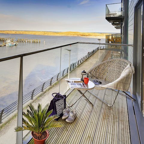 Sit with a book on the balcony and enjoy the calmness of the water