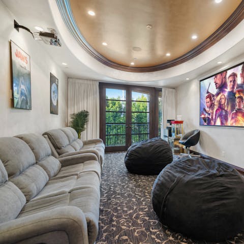 Watch a film in the state-of-the-art theatre room