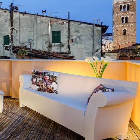 Sip negronis on the outdoor sofa with cathedral views at sunset