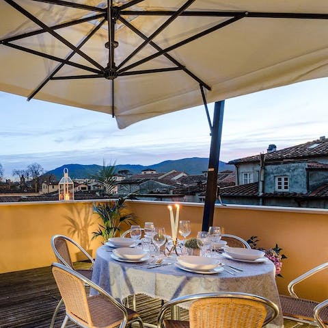 Serve up fresh Tuscan fare and chilled wine on the private terrace, overlooking the hills