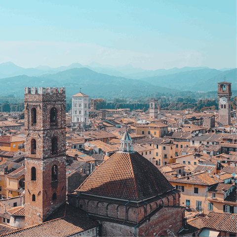 Explore the walled city of Lucca and stop for a coffee at the Piazza del Giglio, a minute from home