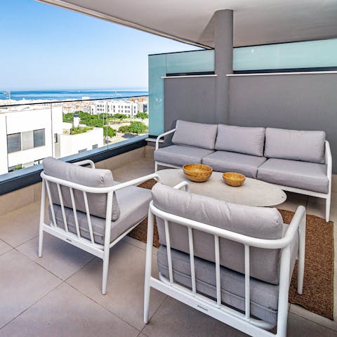 Unwind on the private terrace with sea views 