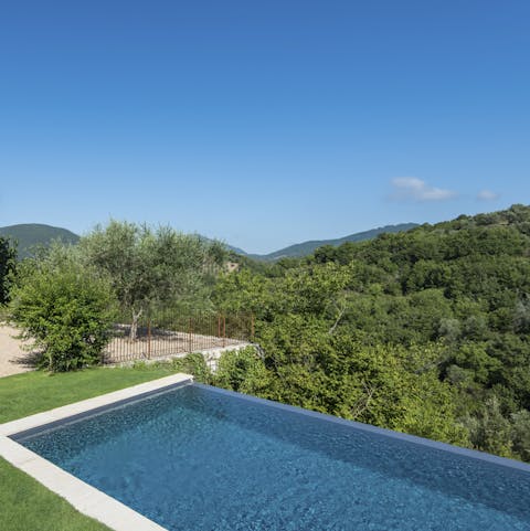 Gaze down at the tree tops from the infinity pool