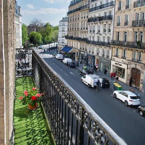 Sip your morning coffee on the private balcony as Paris wakes below