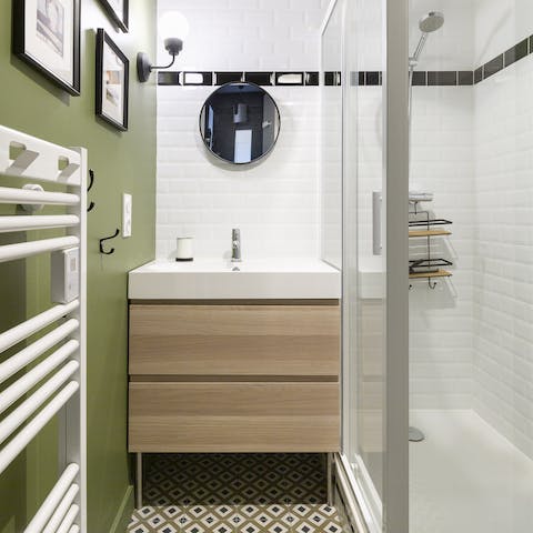 Freshen up in the rainfall shower in your stylish bathroom