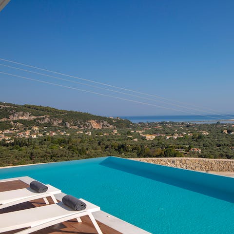 Swim to the pool's edge for the best view of the lush landscape 