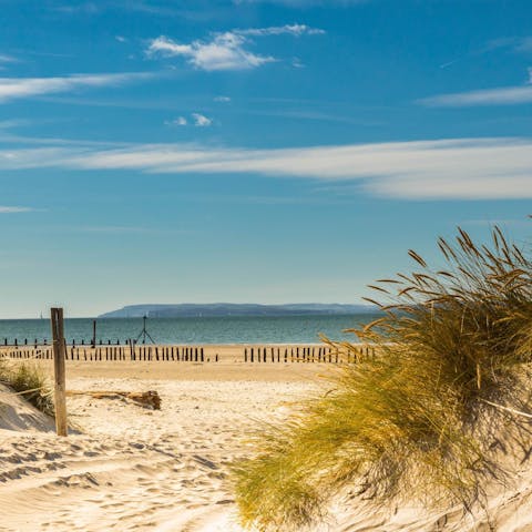 Drive down to the golden sands of East Wittering Beach