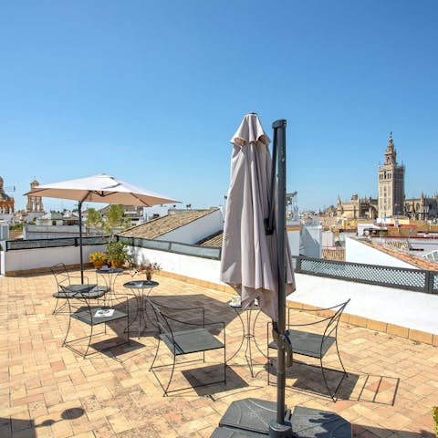 Take in the stunning views over the city from the shared rooftop terrace