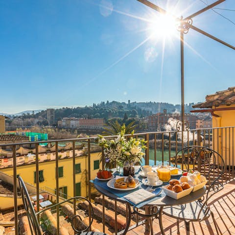 Gaze out at the River Arno as you sip your morning coffee