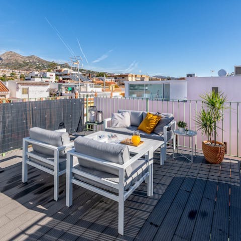 While away your free time on the roof terrace, soaking up the mountain views and fresh coastal breeze