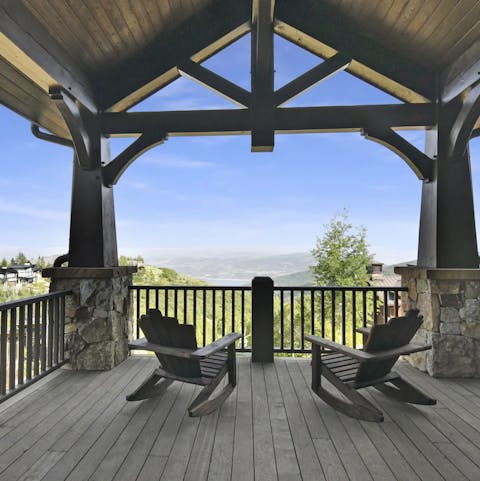 Gaze out at the mountain and lake view from the covered terrace