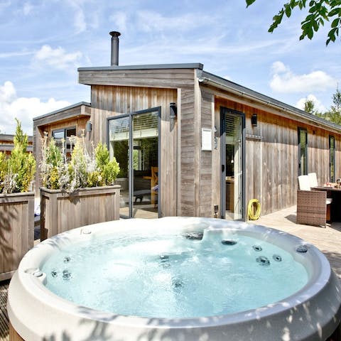 Sip champagne in the private, outdoor hot tub to start off the holiday in style