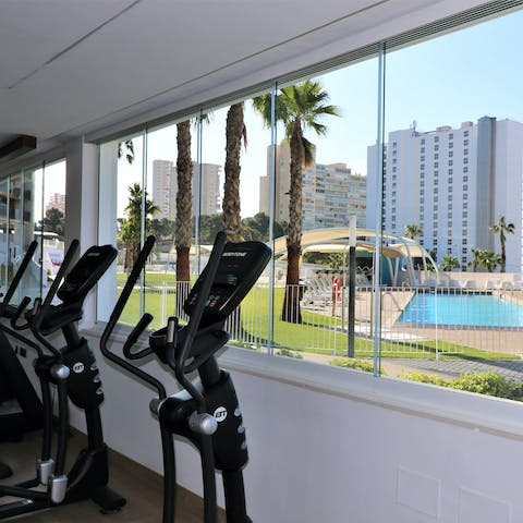 Train in the well-equipped gym that enjoys a great view over the grounds