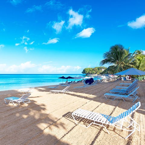 Spend the day at Barbados's pristine Paynes Beach –  directly in front of your home