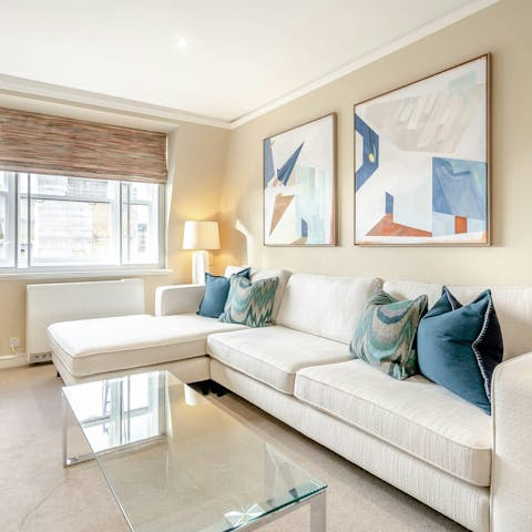 Unwind in the bright living area after venturing across London