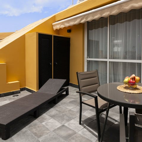 Soak up the Tenerife sun on the private balcony