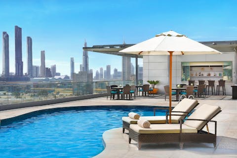 Cool off in the outdoor pool, with sweeping views of the Dubai skyline