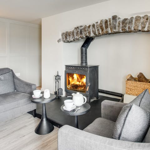 Cosy up in front of the log burner on cooler evenings