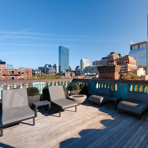 Sit out on the private balcony space, with views spanning across the city