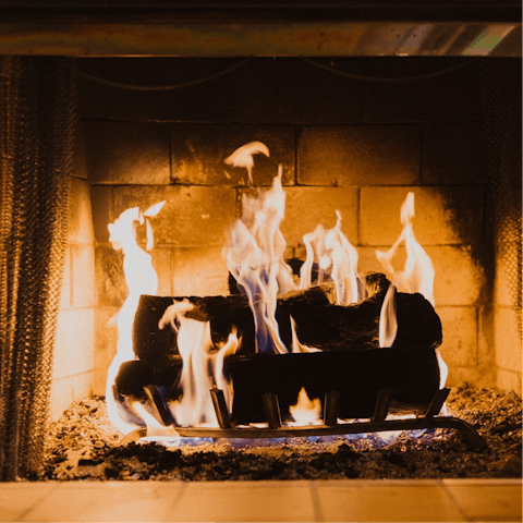 Cosy up around the fire after long days immersing yourself in nature
