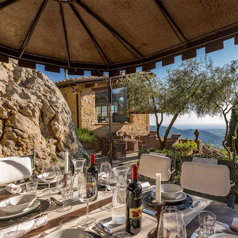 Set up for long, lazy lunches, shaded from the Tuscan sun