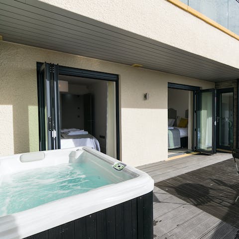 Soak in the luxurious hot tub for two 